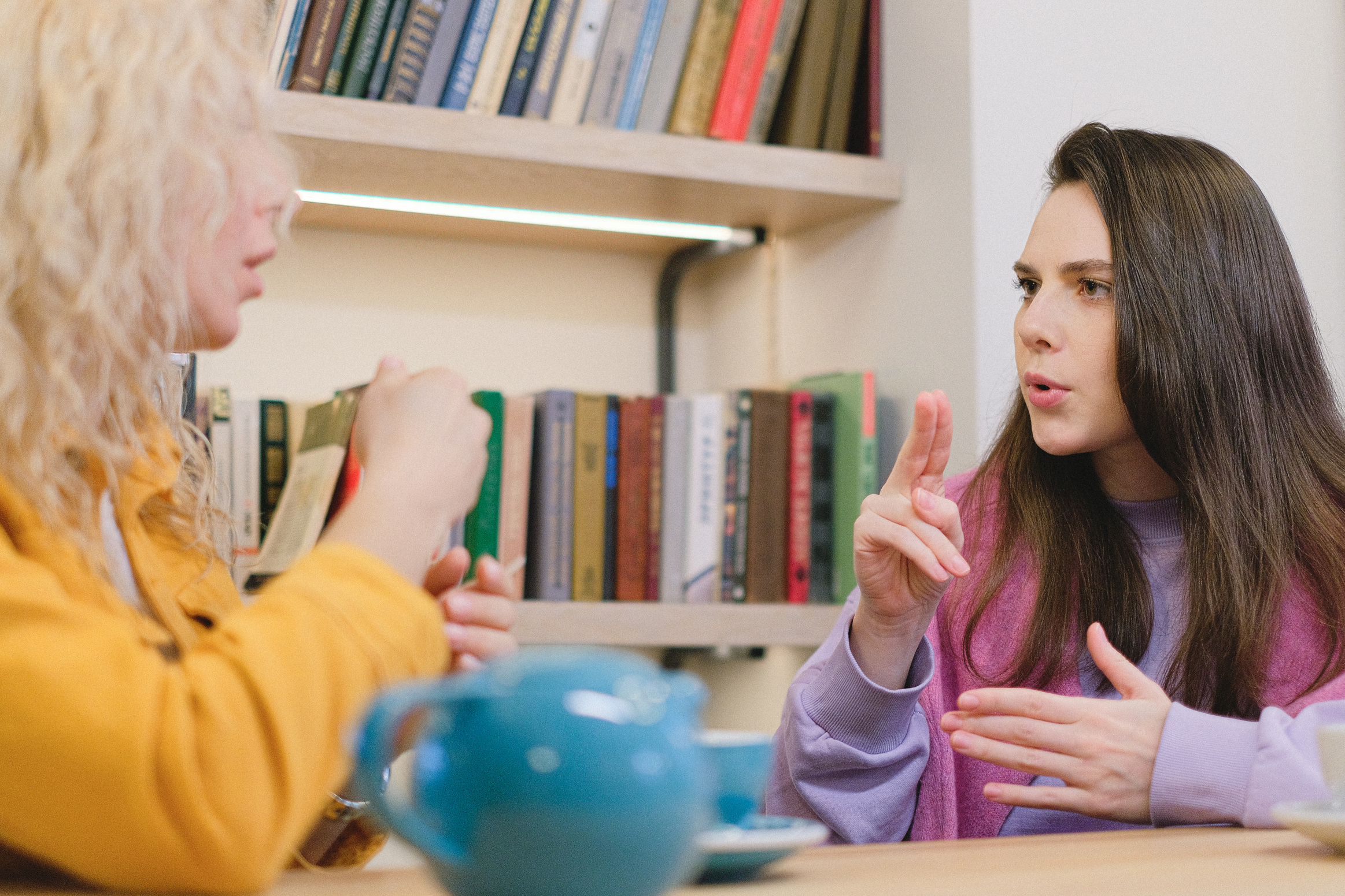 Deaf friends in university library